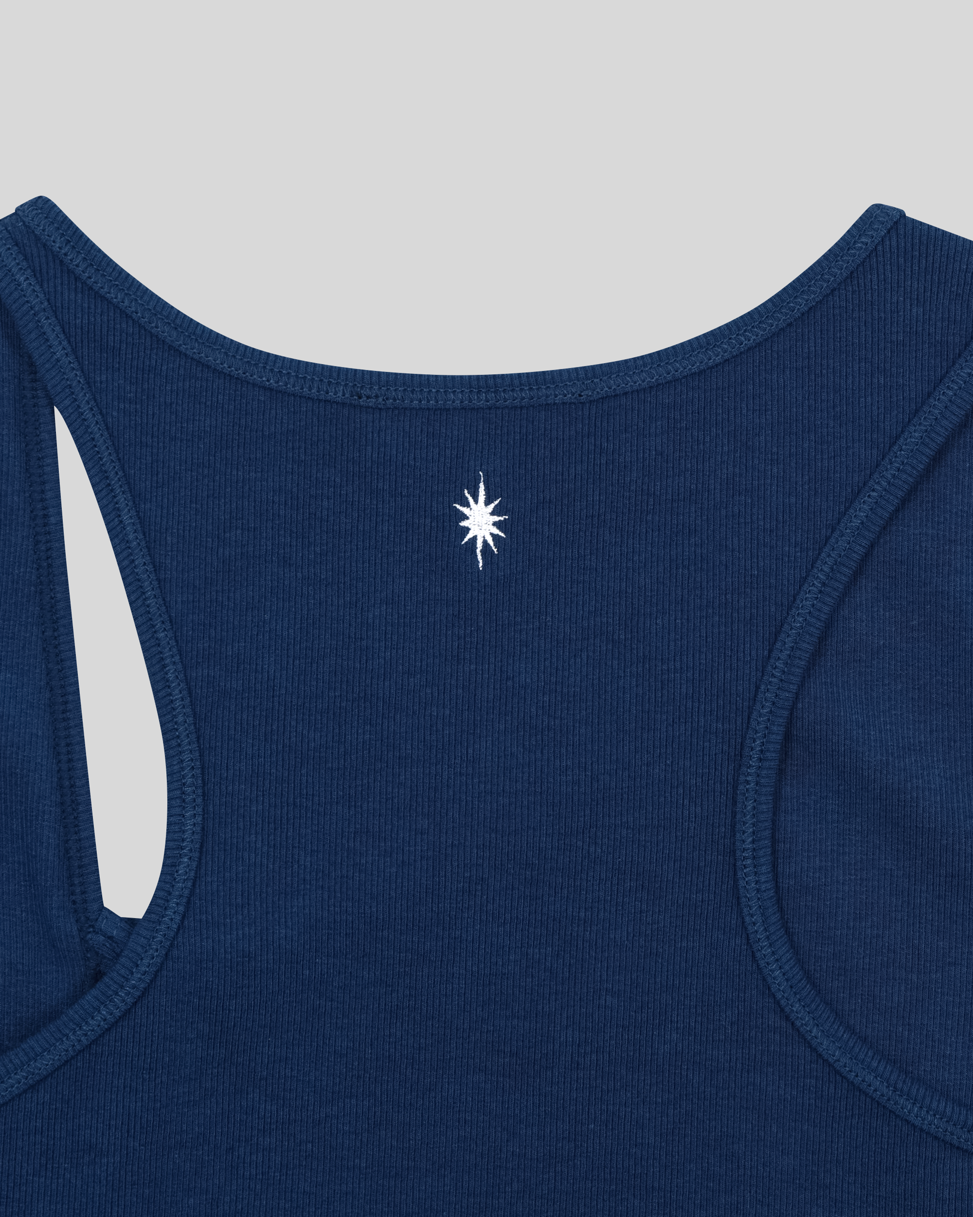 ASYMMETRICAL TANK TOP
